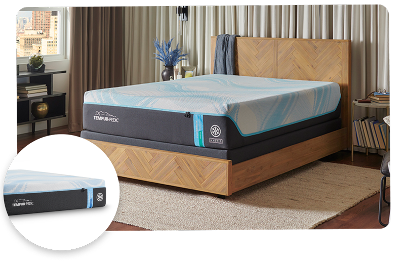 Tempur-Pedic LuxeBreeze mattress on a wooden bed frame