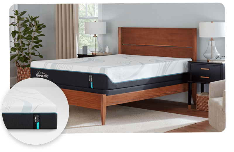 Tempur-Pedic Adapt mattress on a wooden bed frame